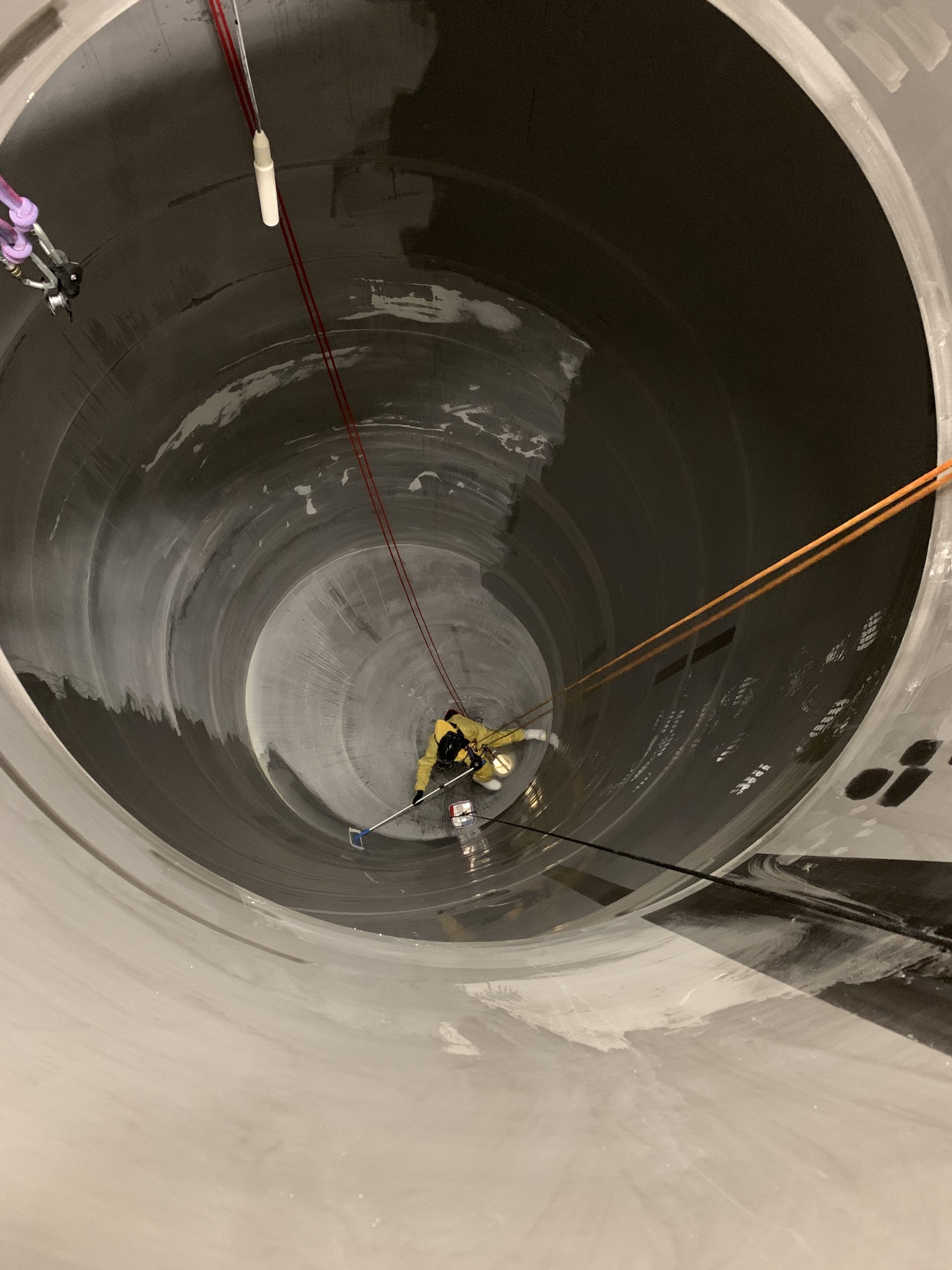 Initial clean inside confined space by rope access