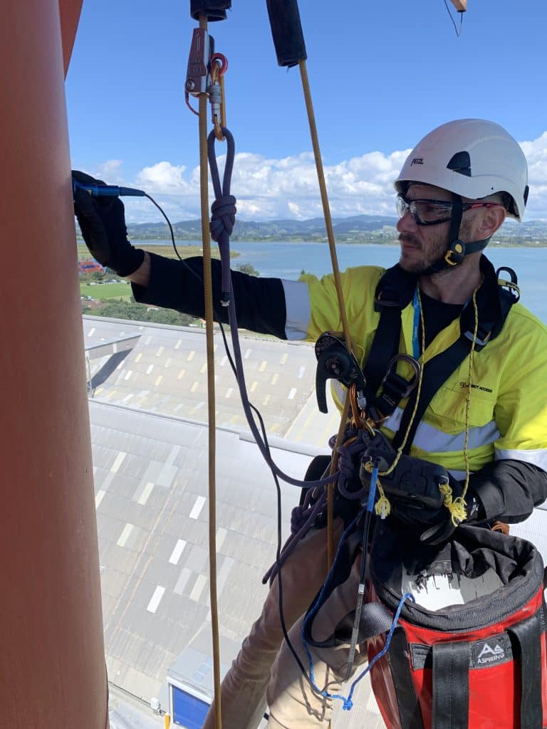 Connect Access technician abseiling on a building