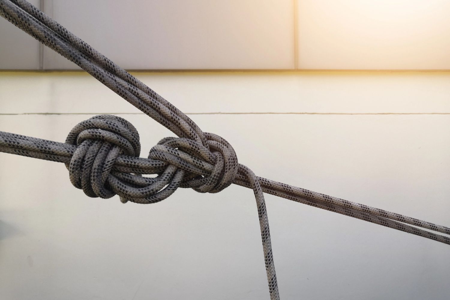 Industrial abseiling ropes tied together in a safe knot
